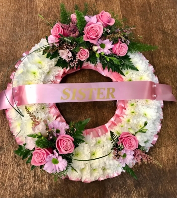Wreath with Sister sash