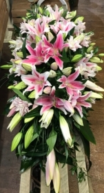 Pink lily double ended coffin spray